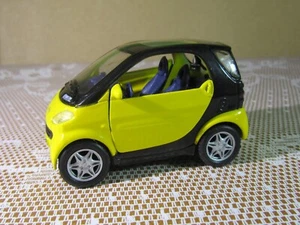 499Z Maisto China Smart City Coupe 2004 Yellow 1:33 Friction Toy Tested OK - Picture 1 of 11