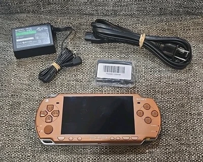 /RARO 2007\ Sistema portátil Sony PSP 2000 bronce mate. ¡La unidad está en excelente forma! Foto 1 de 4