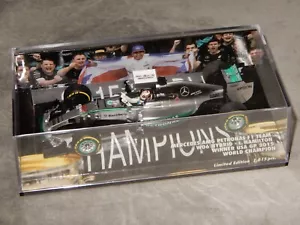 Minichamps F1 1:43 L Hamilton Mercedes AMG W06 Winner USA GP World Champion 2015 - Picture 1 of 5