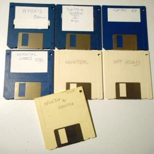 LOT disquettes 7x jeux Amiga :NORD & SUD, HUNTER, HYBRIS,SWITCH BLADE 2,SATAN... - Imagen 1 de 11