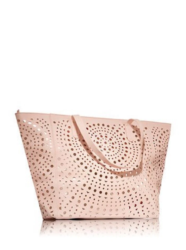 Bolso de Mano Perforado Láser Rosa/Dorado Foto 1 de 1