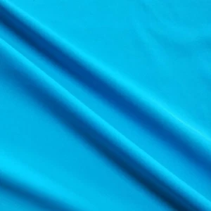 Discount Fabric Polyester Scuba 4 way Stretch Solid Caribbean Blue LY991 - Picture 1 of 1
