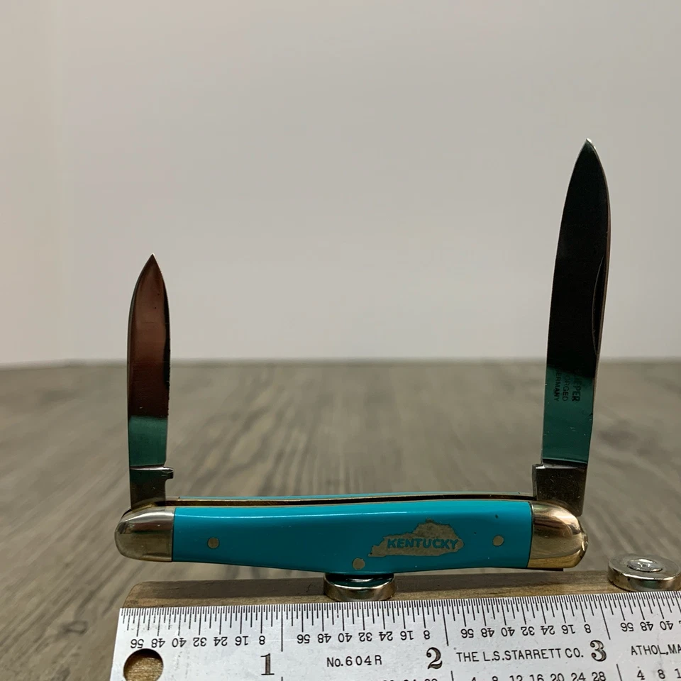 Cuchillo pluma Carl Schlieper ojo alemán Kentucky escudo azul 2 hojas (111) Foto 1 de 4