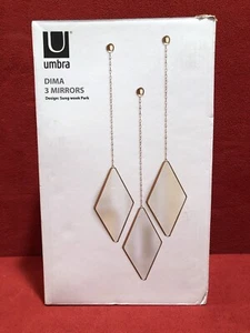 Juego de 3 espejos decorativos trío Umbra Dima para pared color cobre - Imagen 1 de 11