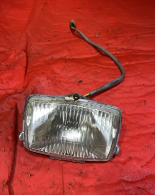 Faro delantero Yamaha Moto-4 1987 YFM225 YFM 225 A 59V-84320-01-00 Foto 1 de 4
