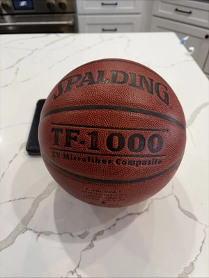 Balón de baloncesto compuesto de microfibra SPALDING TF-1000 ZK 29,5 NFHSO para hombre Foto 1 de 4