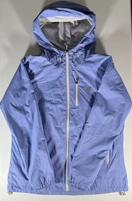 Chaqueta de lluvia New Balance Winbreaker con capucha para mujer XL azul forrada de malla para correr Foto 1 de 4