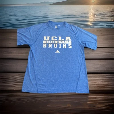 Camisa Adidas Climalite UCLA Bruins Equipo de Atletismo Emitida Azul Medio NCAA Foto 1 de 4