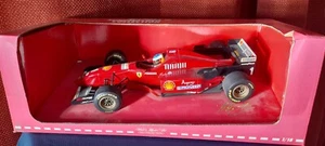 Paul's Model Art Collection Ferrari F310 Michael Schumacher 1996 New - Picture 1 of 9