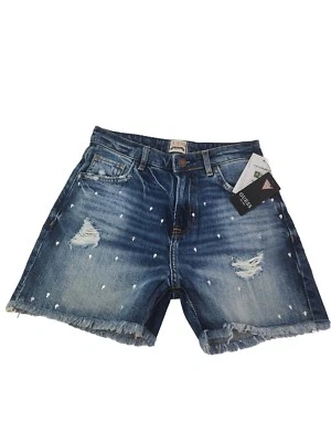 Pantalones cortos de mezclilla de bambú Guess para niñas con tirantes cortos talla 14. Foto 1 de 4