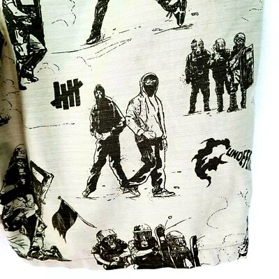 Pantalones Cortos UNDEFEATED Estampado de Disturbios Crema Caqui Estampado Completo Antifa Para Hombre 30 ¡USADOS EN EXCELENTE ESTADO! * Foto 1 de 4