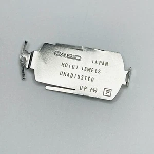 Casio 103 Akkudeckel Clip Casio AA85 Zelle Batteriehaltekappe + Schraube - Bild 1 von 7