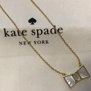 Kate Spade Bow Mini Pendant Necklace NWT Mother Of Pearl & Crystal + 3” Extender - Picture 1 of 7