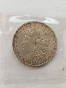 1883 Morgan silver dollar O Mint $1 US Coin in plastic sleeve SHIPS FREE - Picture 1 of 2