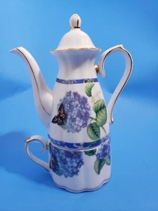 Tetera apilable vintage y taza de porcelana con hortensias azules y mariposas - Imagen 1 de 17