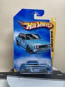 2009 Hot Wheels New Models #37/42 Datsun Bluebird 510 Coupe Blue Mtflk w/OH5 NIP - Picture 1 of 15