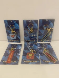 6 x Timezone Key Rings Set: TZ Heart Battery Trophy 60% Acrylic 40% Iron - Bild 1 von 9