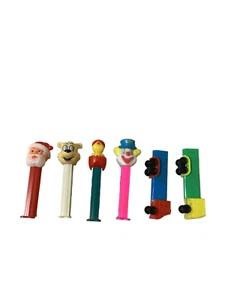 6 PEZ DISPENSER 2 Trucks, Icee Bear, Clown, Santa Claus, Chick In Egg - Picture 1 of 6