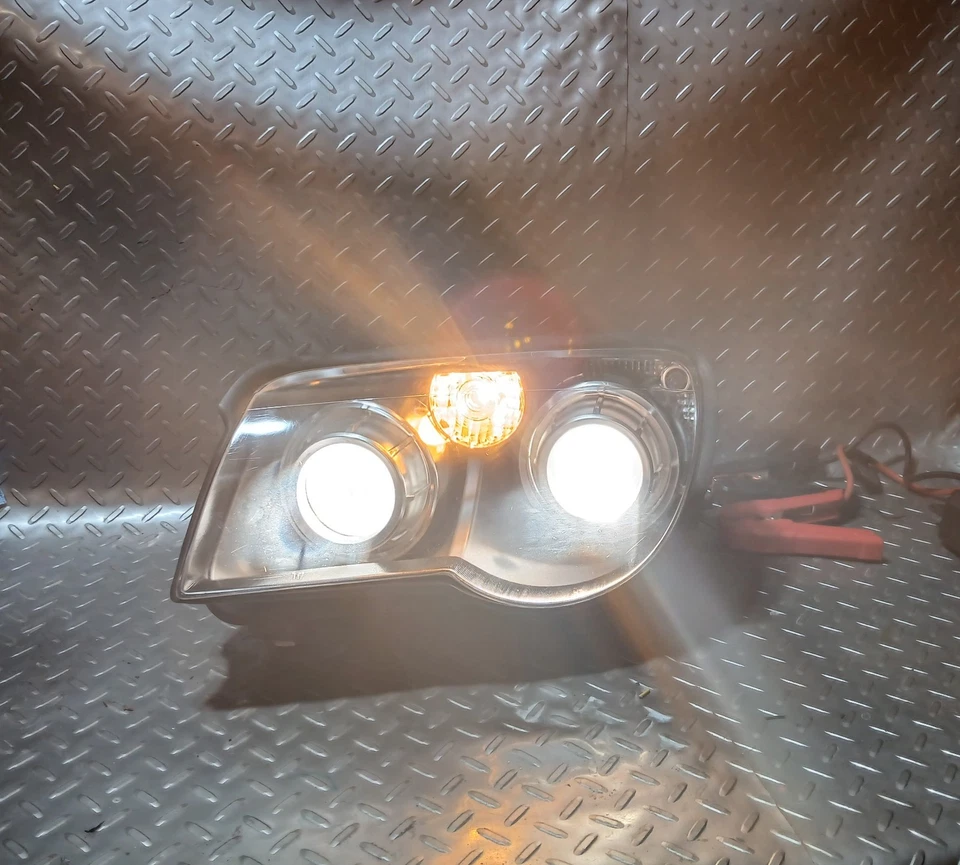 2004-2006 OEM CHRYSLER CROSSFIRE DRIVER IZQUIERDA LH MONTAJE DE LÁMPARA DE CABEZA Foto 1 de 4