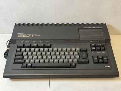 YAMAHA MSX2 YIS604/128 vintage con unità sintetizzatore CX7M testata - Immagine 1 di 4