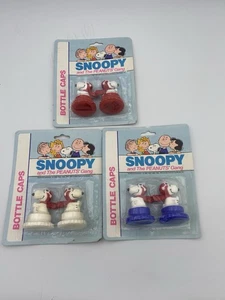 VINTAGE 70er JAHRE SNOOPY KRONKORKEN NOS AUF KARTE ROT/WEISS/BLAU SETS ERDNÜSSE - Bild 1 von 9