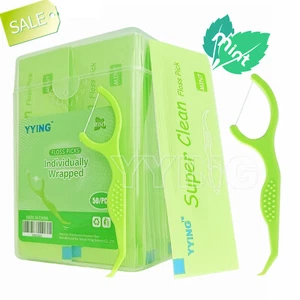 Selecciones de hilo dental 50 CT envueltas individualmente sabor menta hilo dental portátil - Imagen 1 de 12