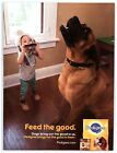 Publicité pedigree imprimée 2022, Dog Howling Little Kid joue de l'harmonica nourrir les bons
