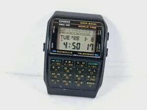 RELOJ PULSERA CASIO DATA BANK DBC-62 WORLD TIME QUARTEZ CALCULADORA VINTAGE - Imagen 1 de 11