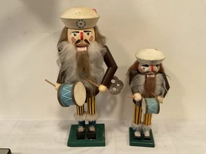 Lot 26 -(2) Wooden Nutcracker Soldiers, w/Drums & Sticks, Wooden Key , 11” & 15” - Picture 1 of 12