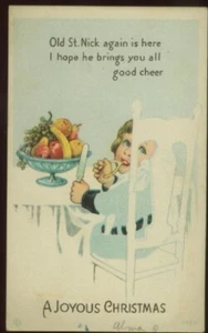 VINTAGE CHRISTMAS POSTCARD CHILD AT TABLE WITH WISHBONE ST NICK IS HERE 052621 R - Picture 1 of 2