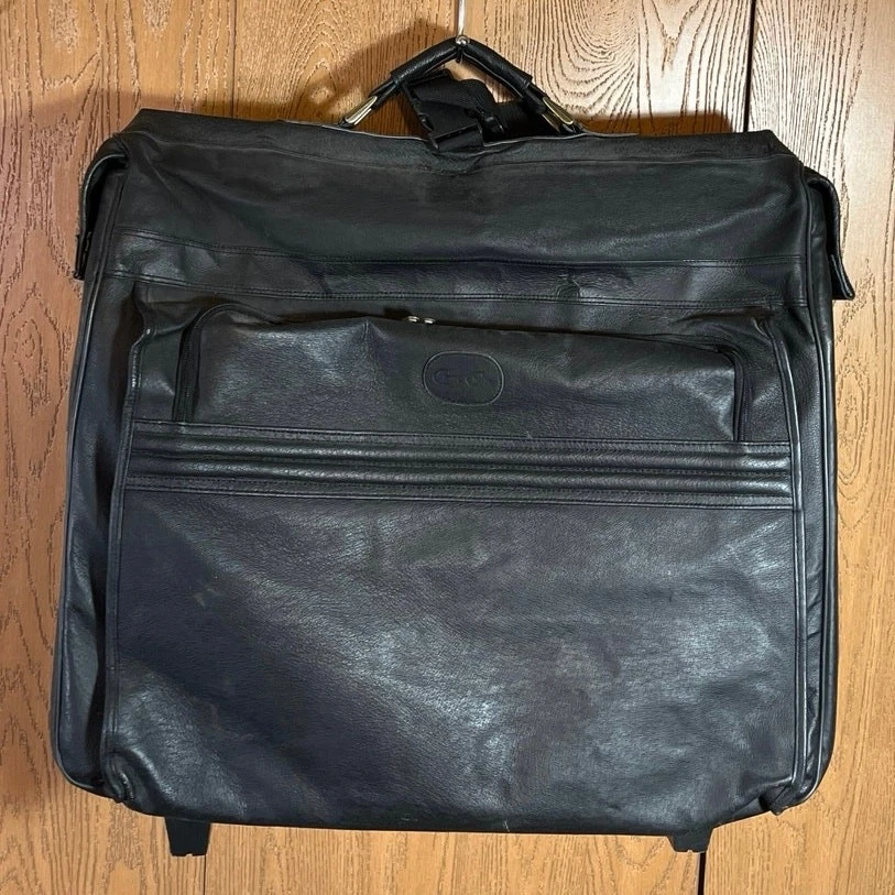 Bolsa de ropa de cuero vintage Claire Chase equipaje de mano con ruedas negra grande Foto 1 de 4