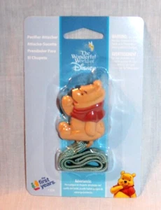 NEW IN PACKAGE  THE FIRST YEARS VINTAGE 2005 WINNIE THE POOH   PACIFIER ATTACHER - Picture 1 of 2