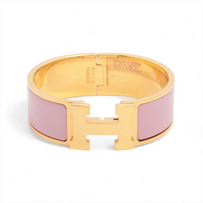 Brazalete grande Hermès click h GP dorado x rosa Foto 1 de 4