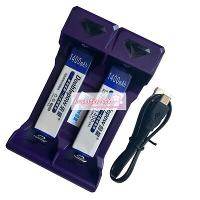 Juego de dos baterías y cargador Gumstick para SONY NH-100WM/NH-14WM/NC6WM WALKMAN Foto 1 de 4