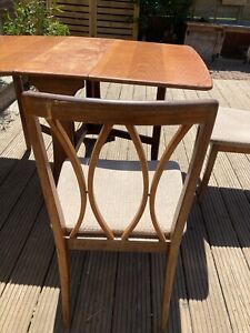 folding table and two chairs teak