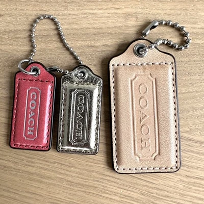 3 Piece Lot COACH Pink/Red (2") Gold (2") Tan (3") Leather Hang Tag Charm  - Image 1 of 4