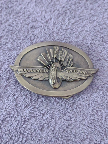 Indianapolis Motor Speedway Brass Belt Buckle with History of Indy 500 on Back Cover