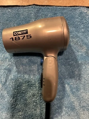 Secador de pelo compacto plegable Conair 1875W tamaño de viaje, doble voltaje Foto 1 de 4