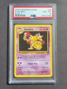 Pokemon PSA 8 KADABRA 46/130 - JUEGO BASE 2 - POCO COMÚN NO HOLO - CASI NUEVO/COMO NUEVO  - Imagen 1 de 2