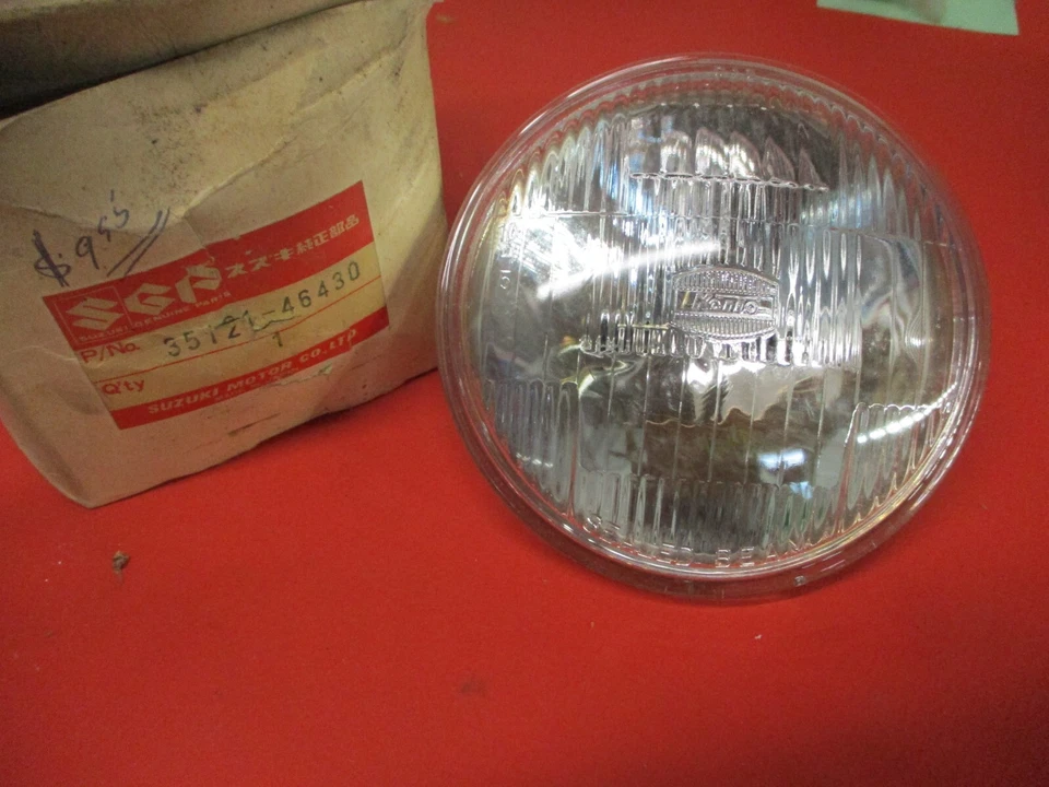 UNIDAD DE LÁMPARA NUEVA ORIGINAL OEM SUZUKI DR370 DS125 DS185 35121-46430 Foto 1 de 2