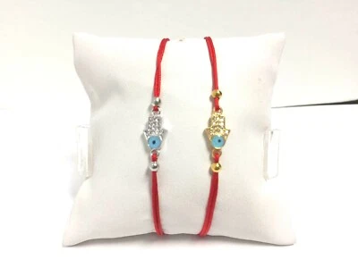 CUERDA ROJA MANO DE FATIMA CON CERÁMICA MAL DE OJO, PROTECCIÓN CABALÁ Foto 1 de 3