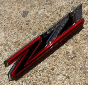 2019-2021 Chevrolet Silverado 1500 Z71 Grille Emblem 84384428 Red Black & Chrome - Picture 1 of 4