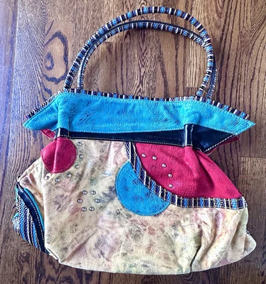 Cirque de Soleil Cartera Bolso de Mano Bolsillo Colorido Texturizado Foto 1 de 4