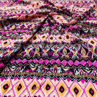 Neon Pink Ethnic Print Nylon  Spandex Fabric 4 Way Stretch By Yard - Image 1 of 4