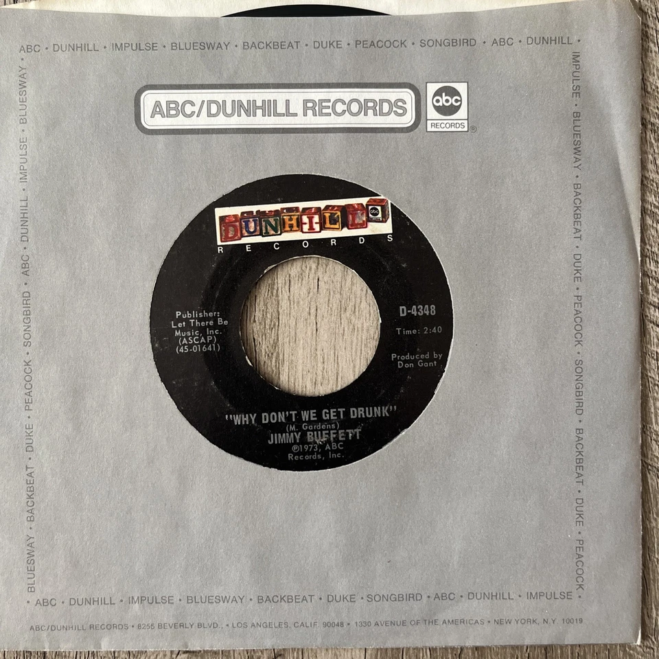 Jimmy Buffett – Why Don't we get Drunk / The Great Filling Station Holdup 45 rpm Foto 1 de 4