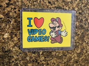 1989 Topps Nintendo Game Tip Sticker Card #16 Mario "I Love Video Games" - Imagen 1 de 2