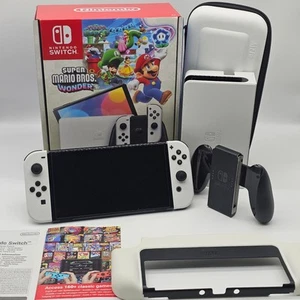 NINTENDO SWITCH OLED BIANCA + MARIO WONDER + ACCESSORI - Imagen 1 de 6