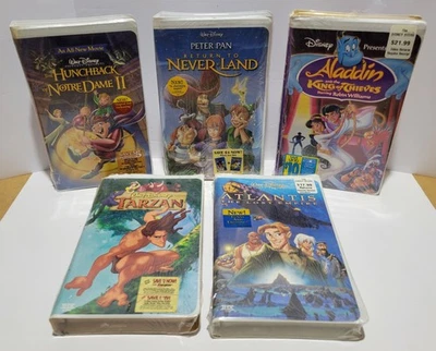 Disney VHS Lot (X5) Atlantis Aladdin Tarzan Peter Pan Hunchback - Factory Sealed - Image 1 of 4