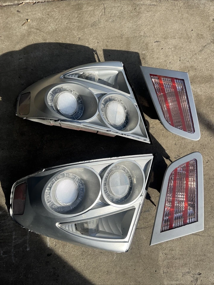 Conjunto de luces traseras LED LH RH usadas genuinas OEM bonitas Infiniti G35 2003-2006 sedán Foto 1 de 4