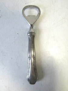 APRIBOTTIGLIA/CAVATAPPI  CON MANICO IN ARGENTO  TESTATO ANNI 60/70 DA COLLEZIONE - Foto 1 di 6